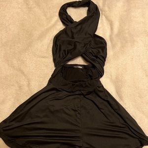 Black Fashion Nova halter top romper, size XS, back out. Fashionnova.